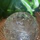 Vase boule en verre ciselé