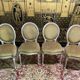 Suite de 4 chaises médaillons de style Louis XVI