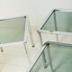 Nest tables in chrome and smoked glass, Italy, 1970s.