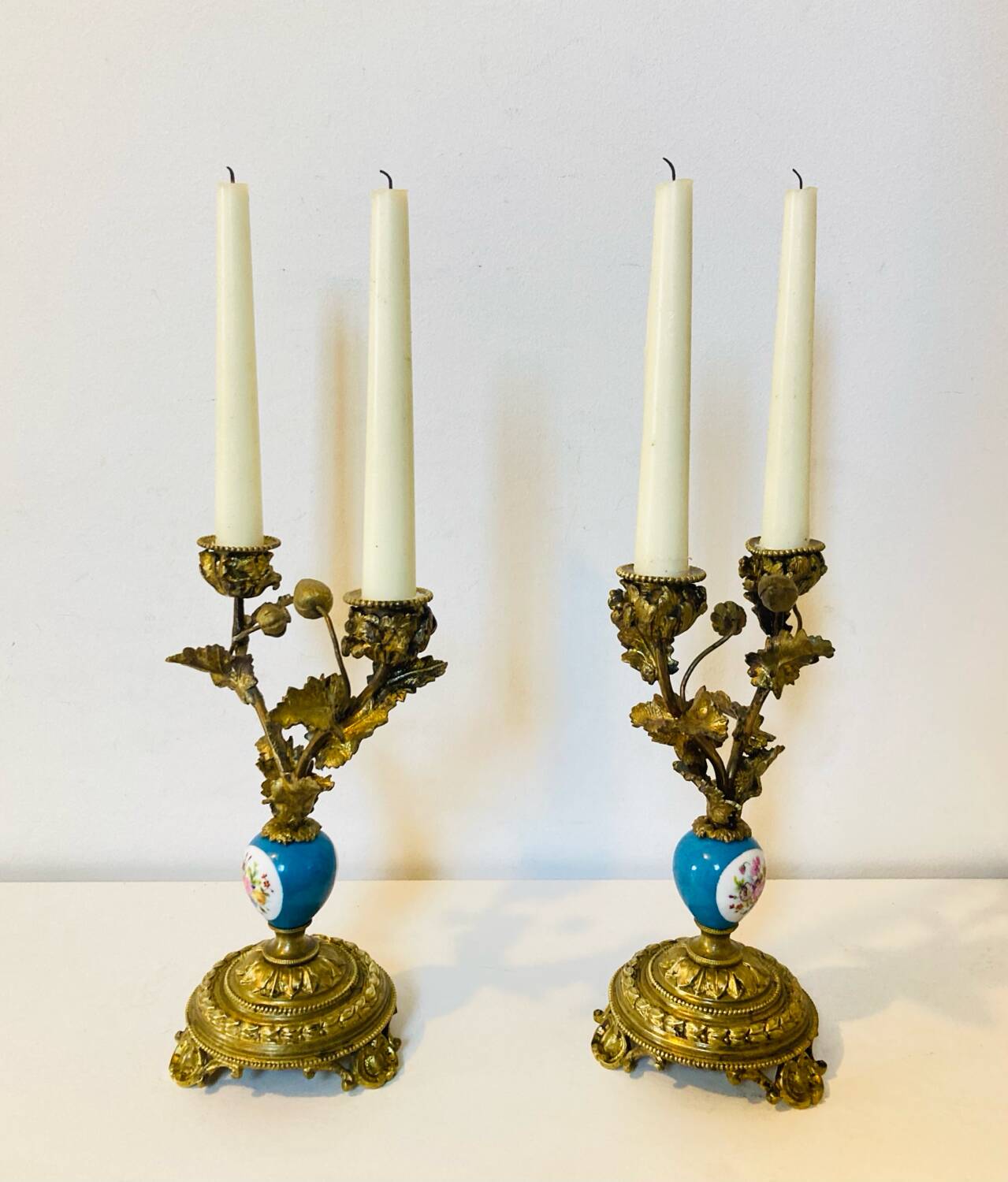 19th century candle holders in gilded bronze and porcelain