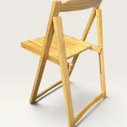 Blonde wooden folding chair in the style of Aldo Jacober.