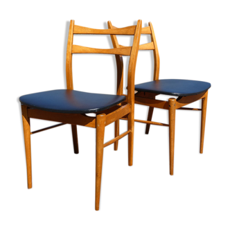 Paire de chaises scandinaves vintage en teck et skai noir