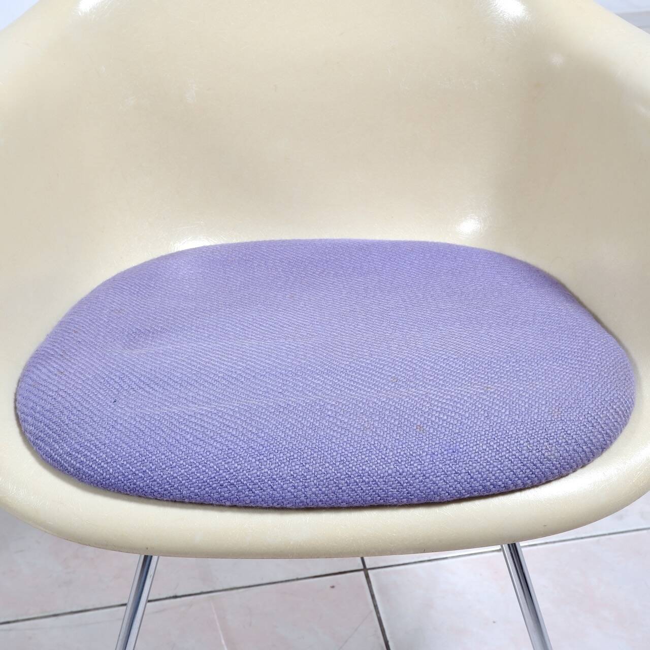 4 Eames DAX fiberglass lounge chairs with purple upholstery by Herman Mille