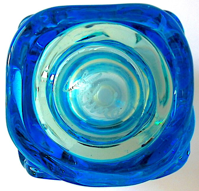 Blown blue glass bottle with inclusions