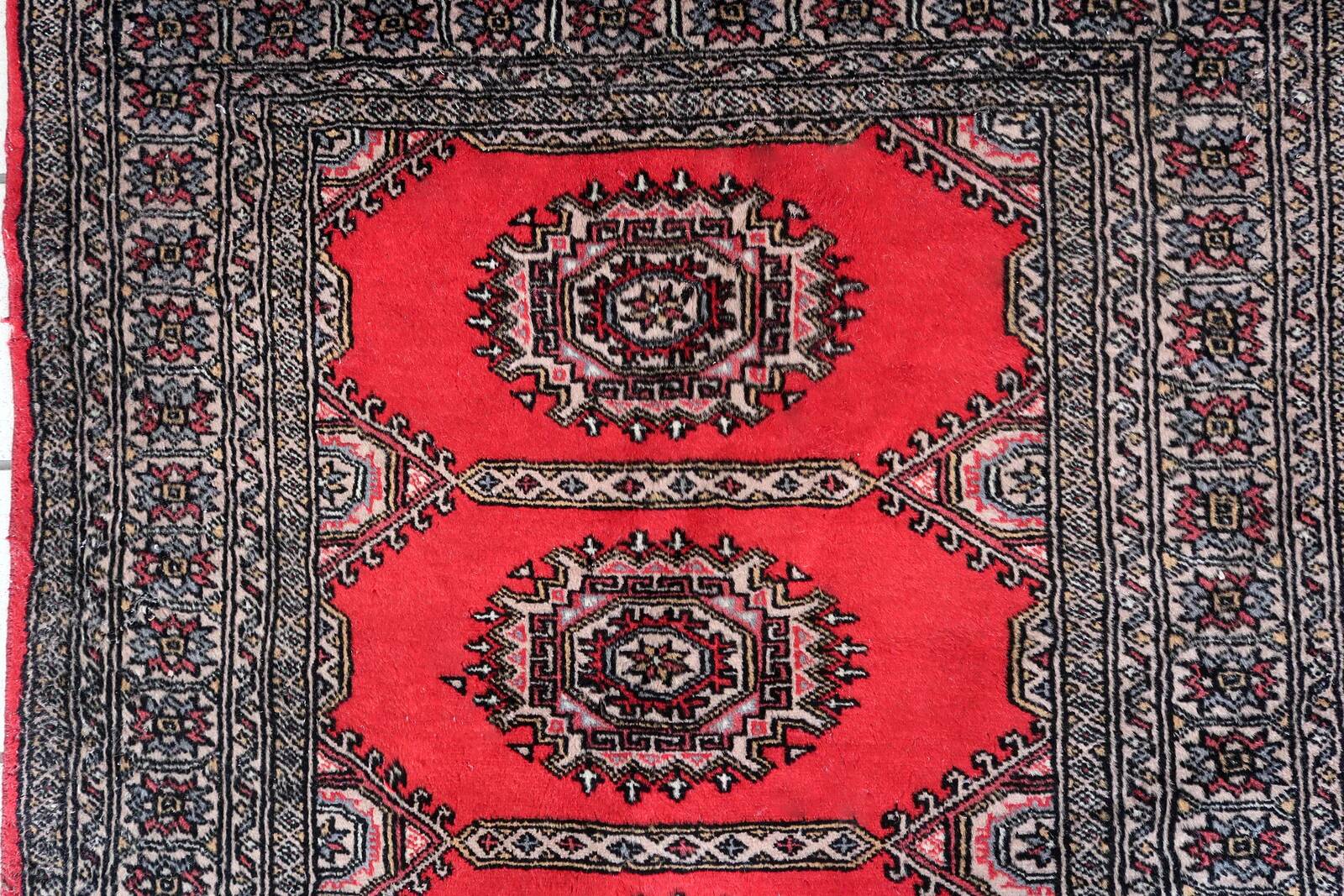 Handmade vintage Uzbek Bukhara rug 92cm x 186cm, 1960s