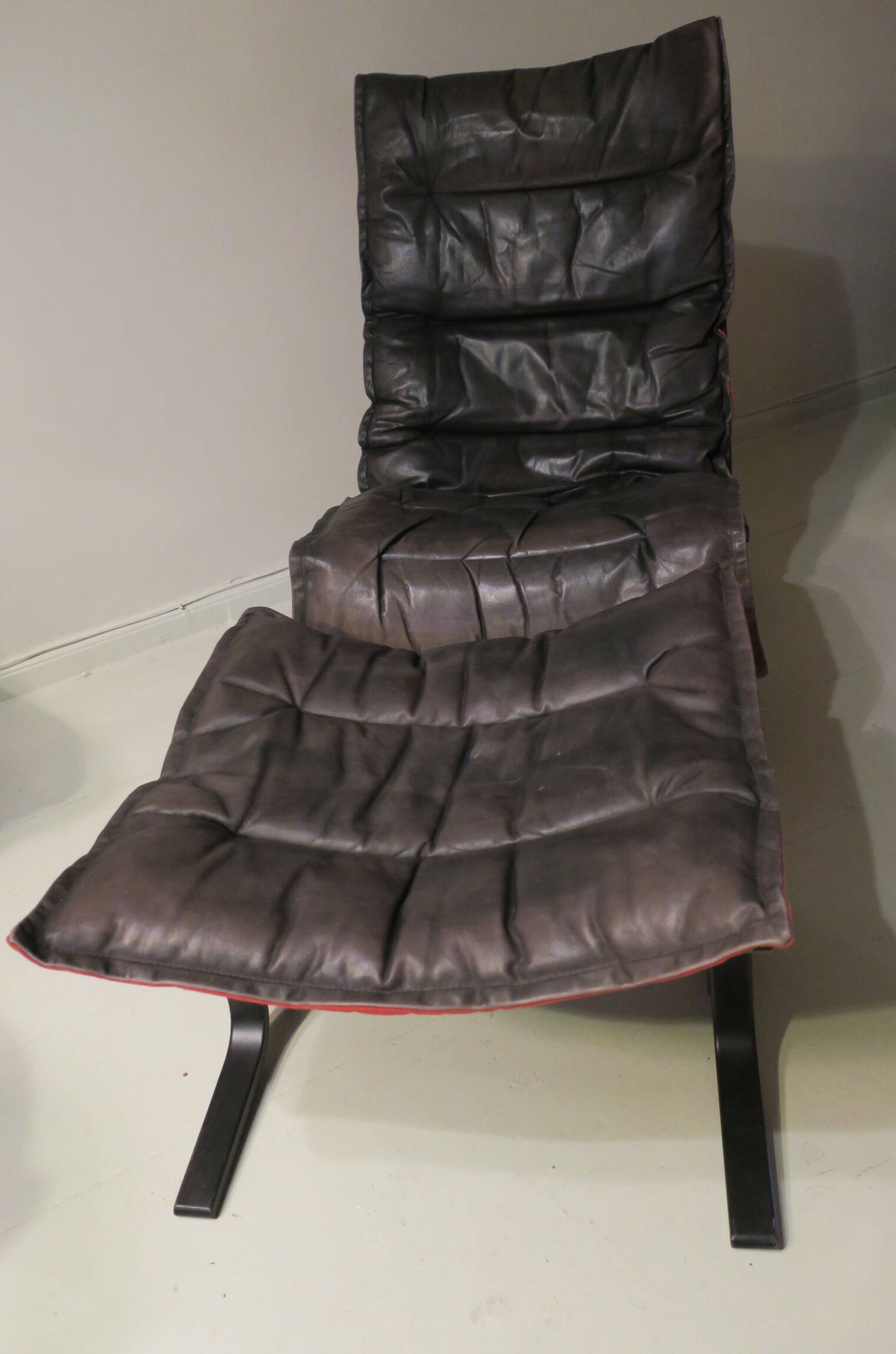 Ingmar Relling patinated leather lounge chair with ottoman, Norway 1960s