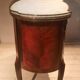 Veneered tambour door chest of drawers