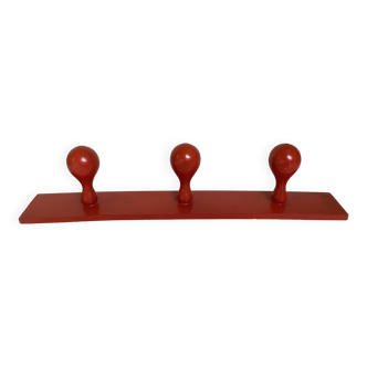 Red wood coat rack