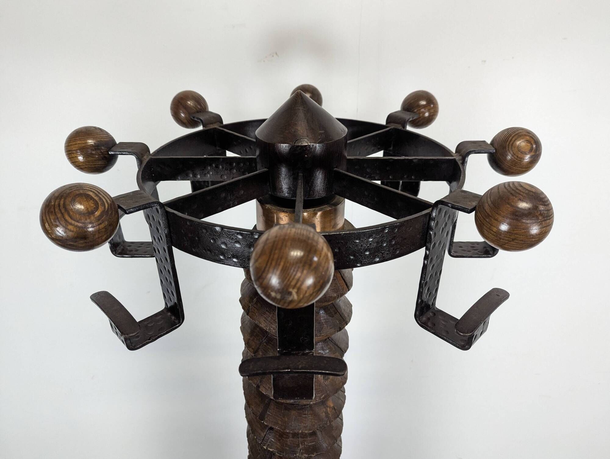 Oak and hammered iron press screw coat rack