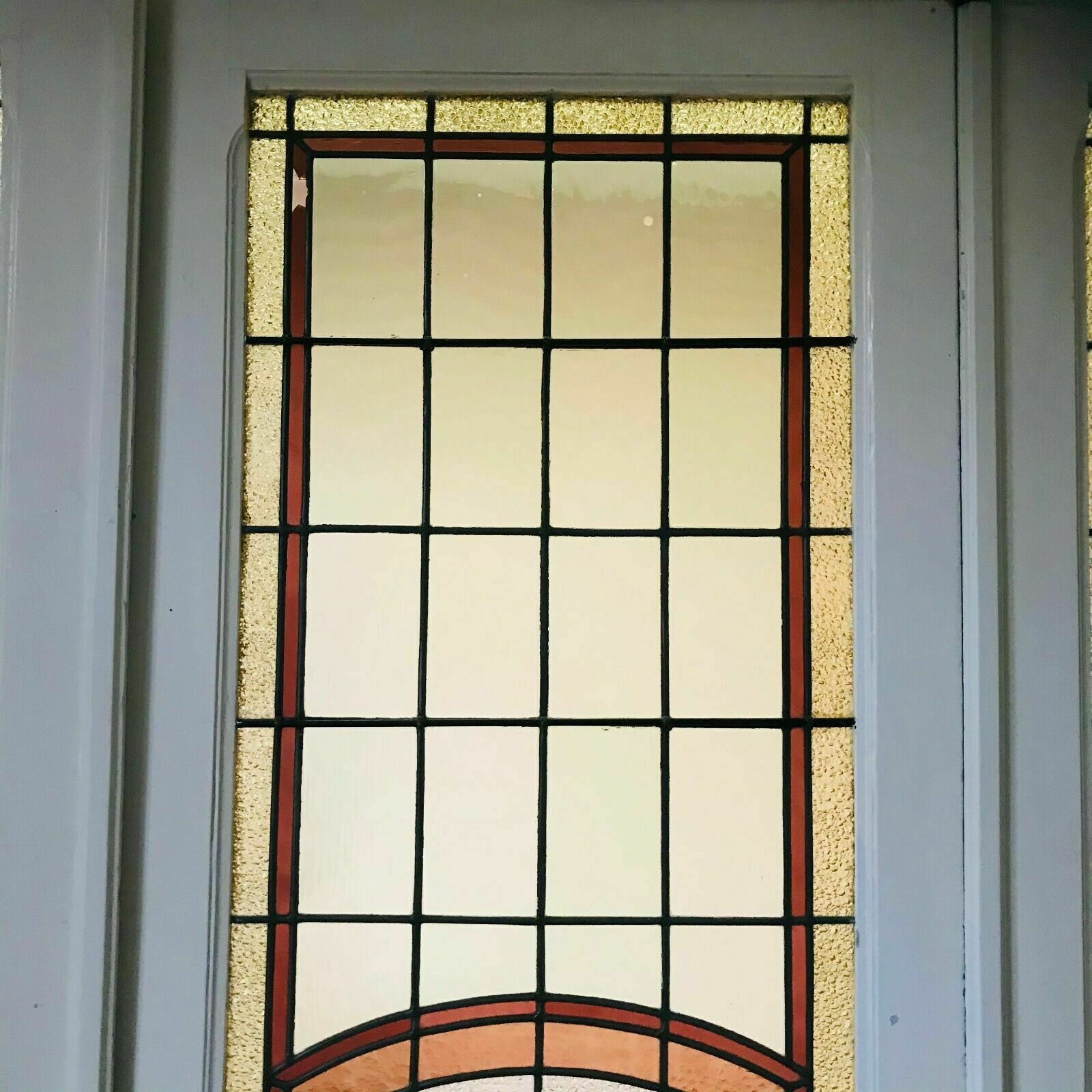 Separation of three doors in 20th century Art Deco stained glass