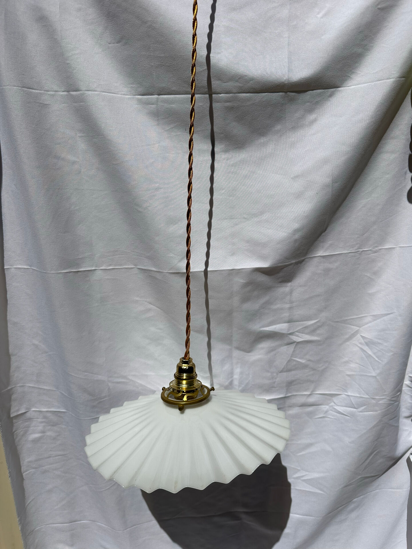 Vintage suspension opaline pleated lampshade with golden threads and claw socket.