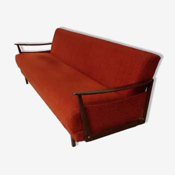 Vintage orange convertible sofa