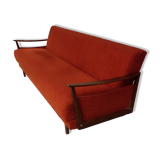 Vintage orange convertible sofa