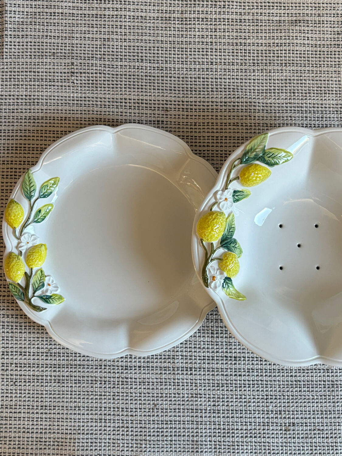 Plate and colander of lemons in slipware