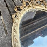Small old oval gilded mirror