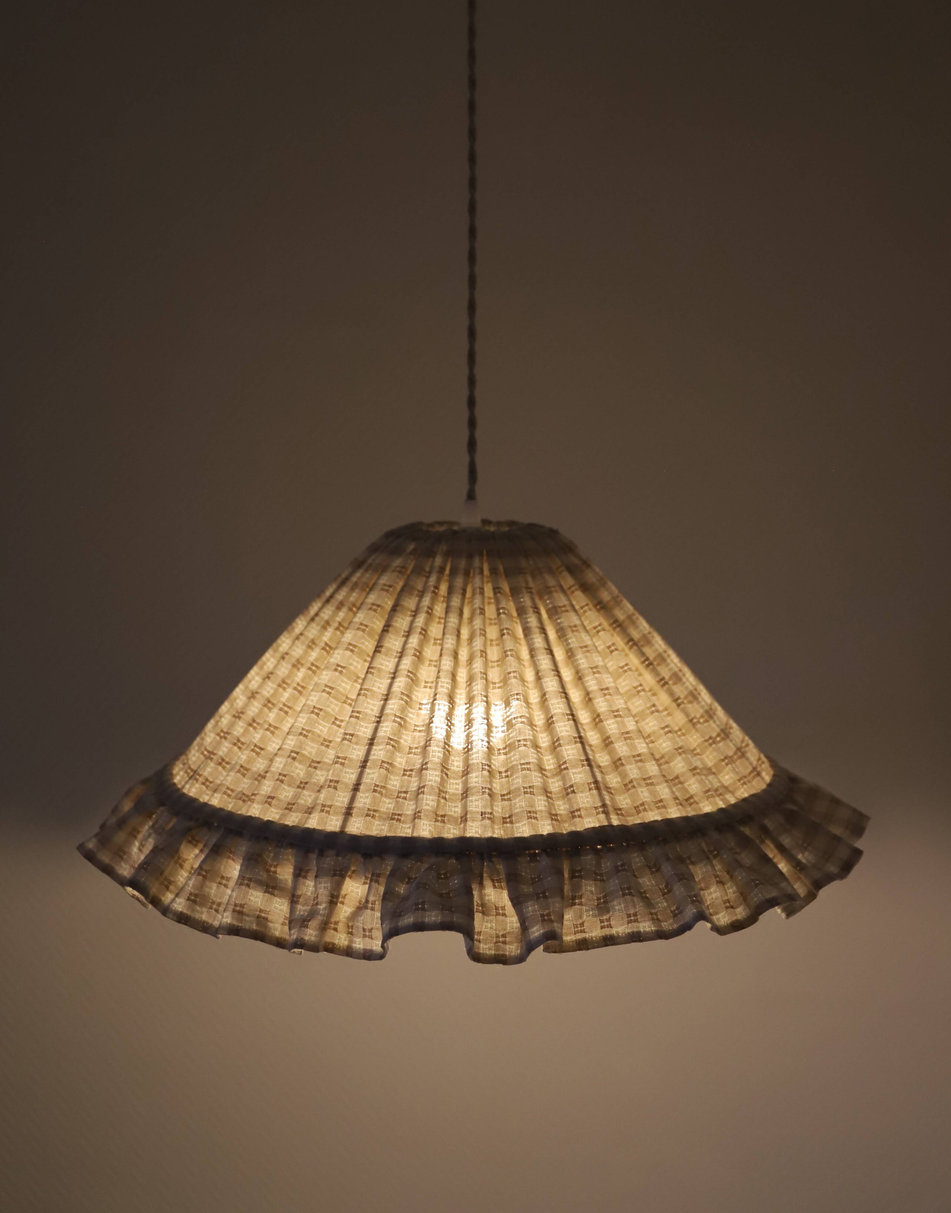 Emilia "small squares" conical suspension with steering wheel