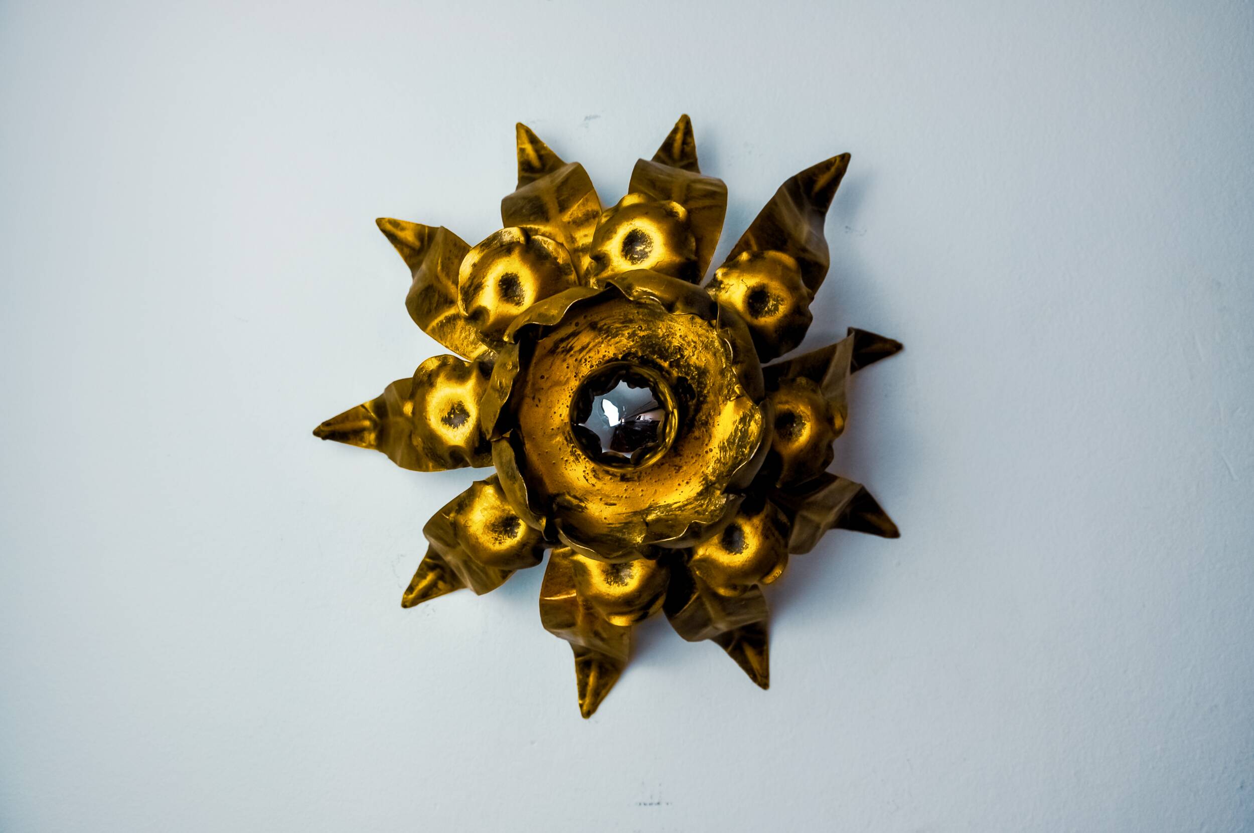 Sun wall lamp by ferro arte, metal and gold leaf, Spain, 1960