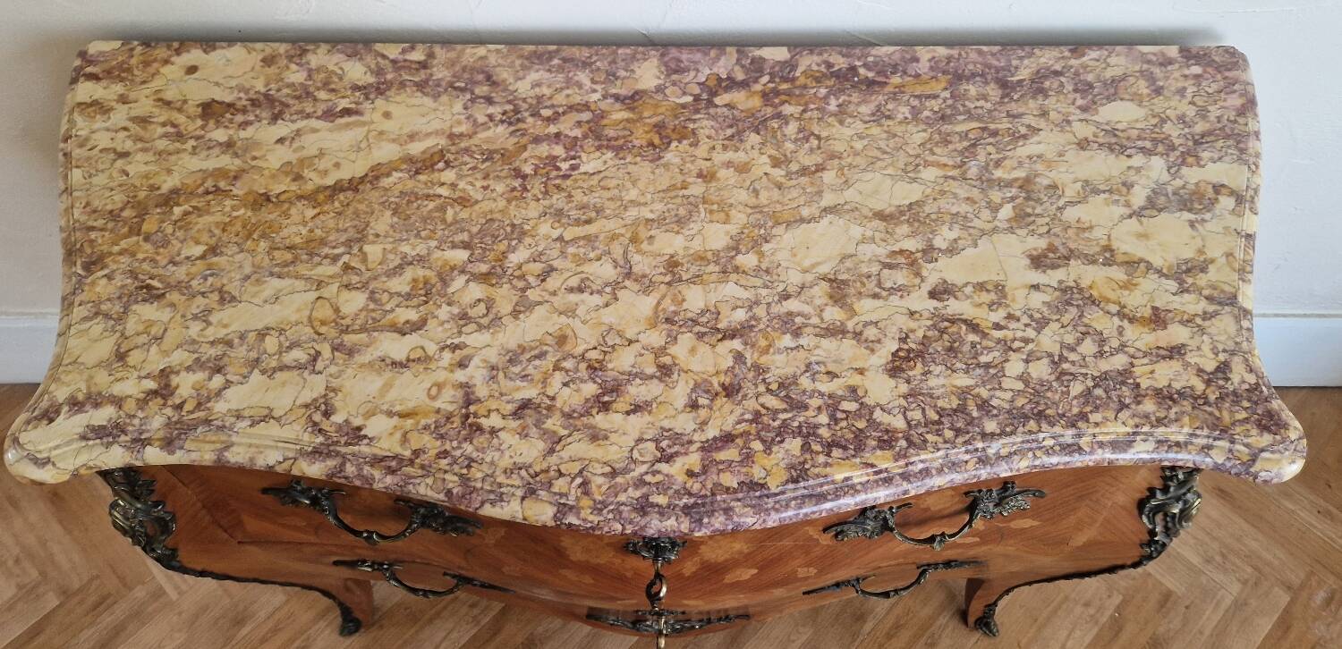Louis XV style commode, pink and ochre marble.