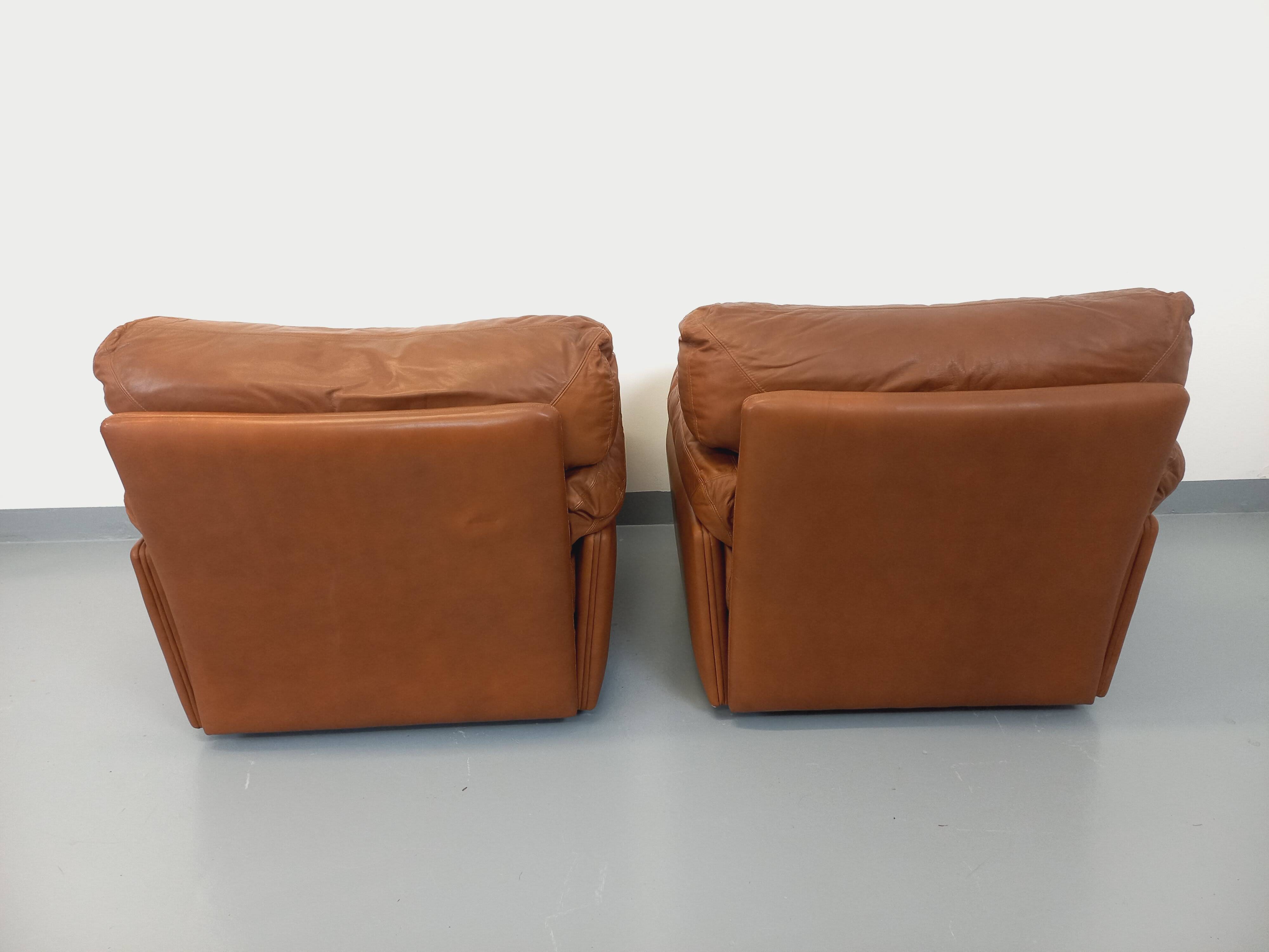 Pair of vintage Coquelicot lounge chairs by Tito Agnoli for Poltrona Frau in leather from the 70s