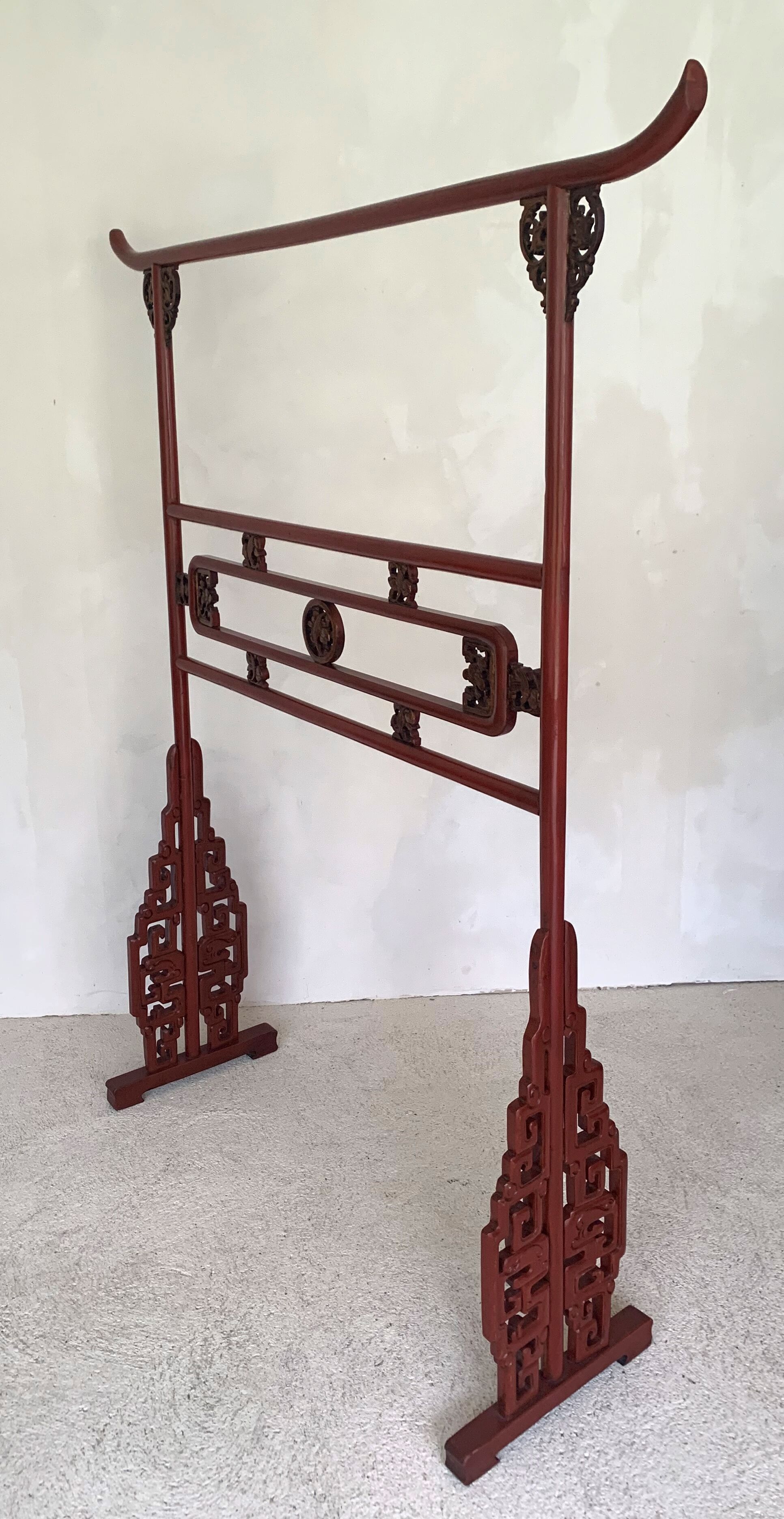 Chinese lacquered clothing holder