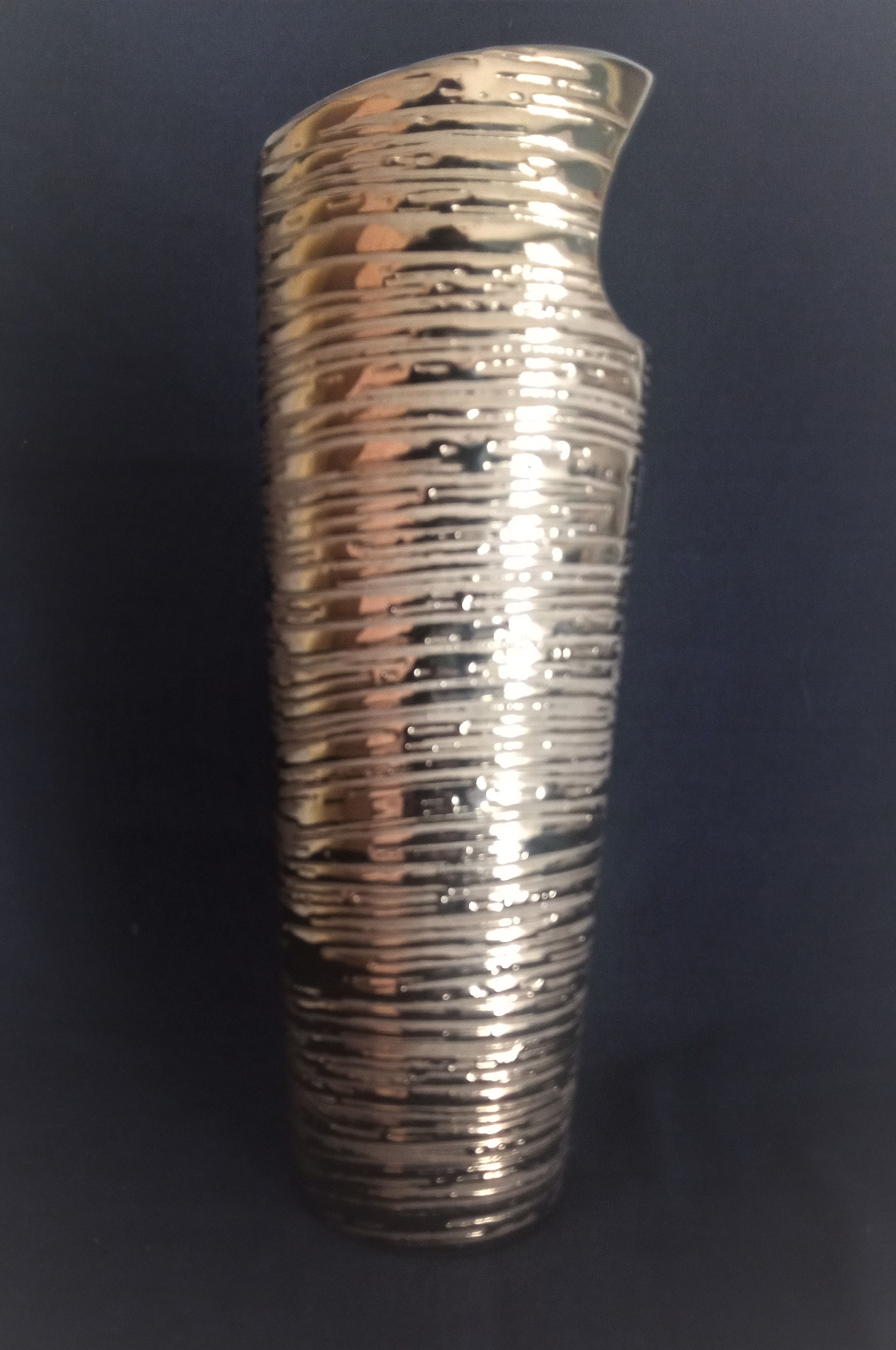 Cubist vase in gilded and ridged ceramic