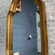 Ancien petit miroir en bois doré années 70