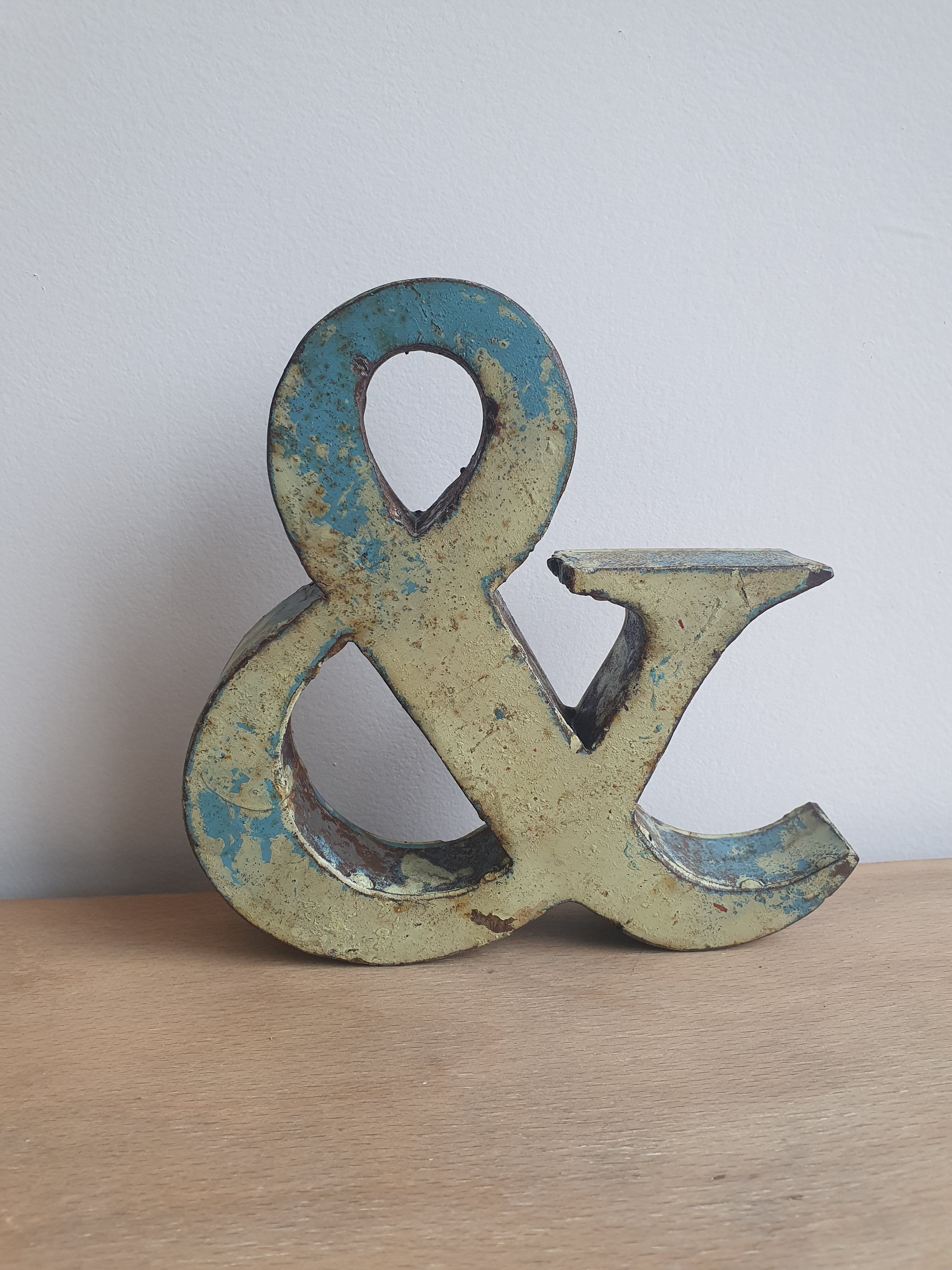 Ancient iron letter