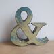 Ancient iron letter