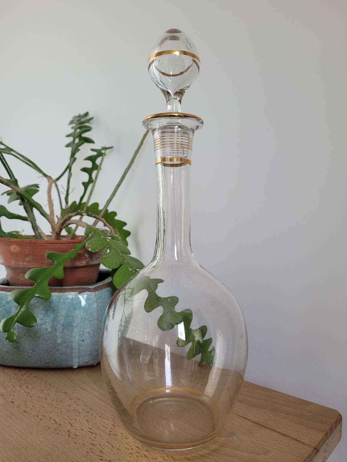 Glass carafe with gold trim