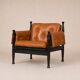 Paire de fauteuils lounge « safari » en cuir cognac et hêtre noir — c. 1970