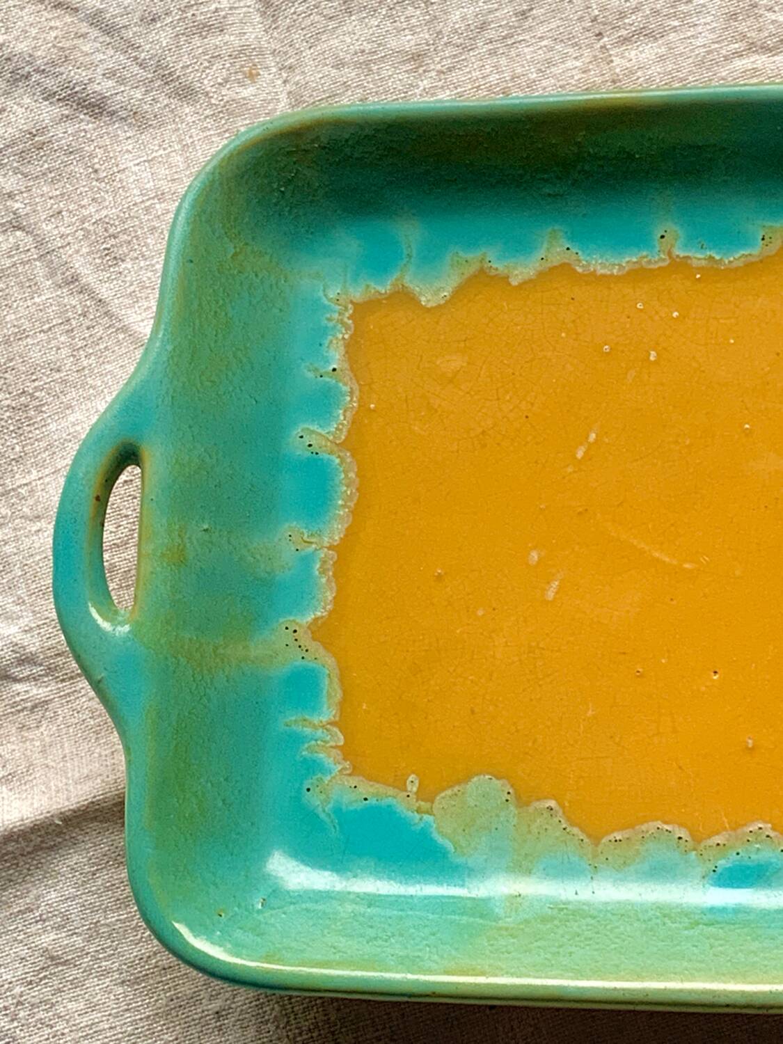 CAB turquoise and ochre ceramic dish with handles