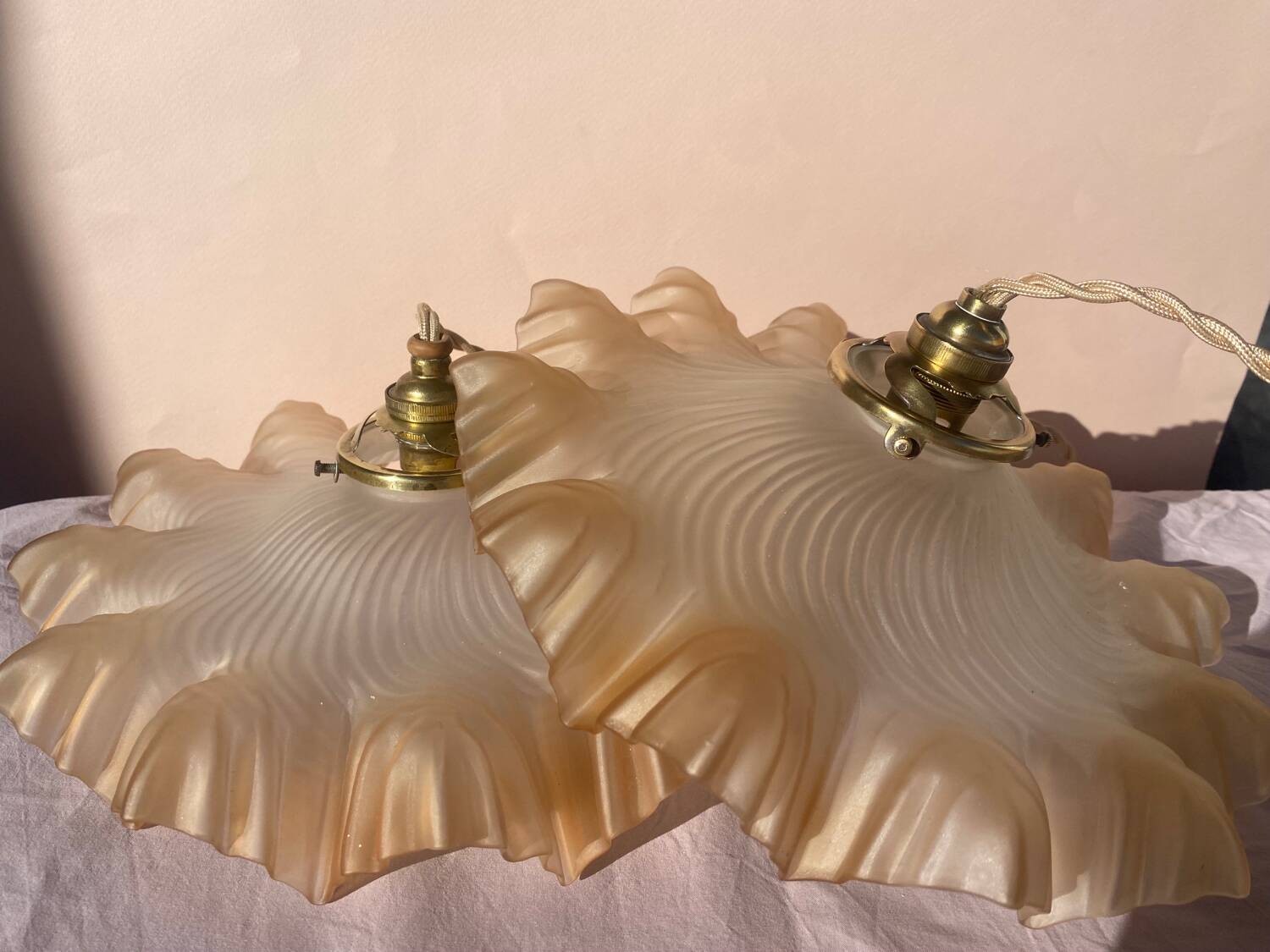 Pair of amber pendant lights