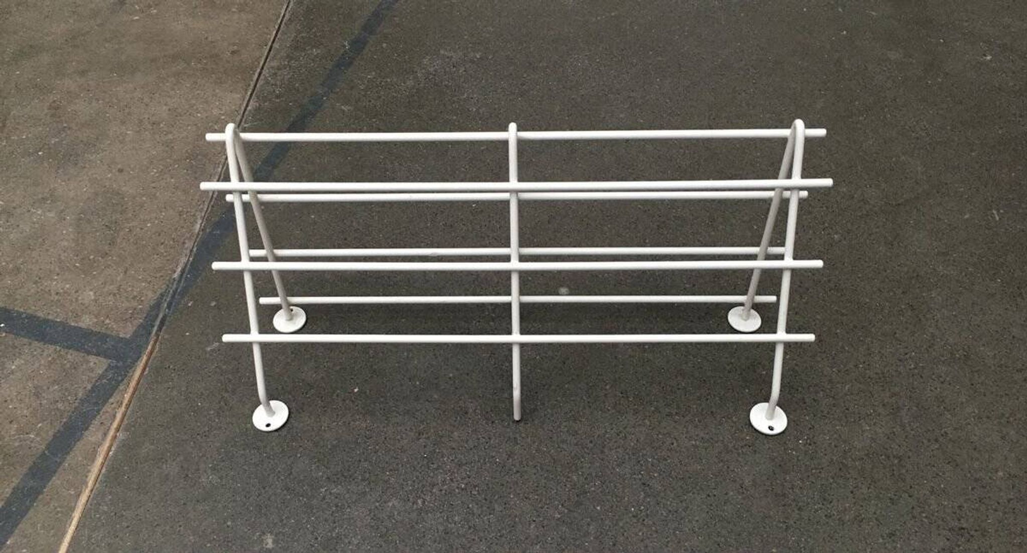 Mid-century modern minimalist metal coat rack from the 1960s.