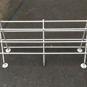 Mid-century modern minimalist metal coat rack from the 1960s.