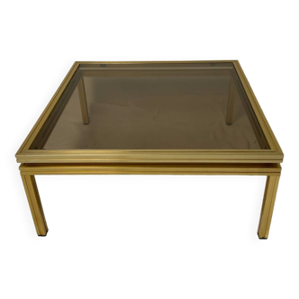 Glass and brass coffee table