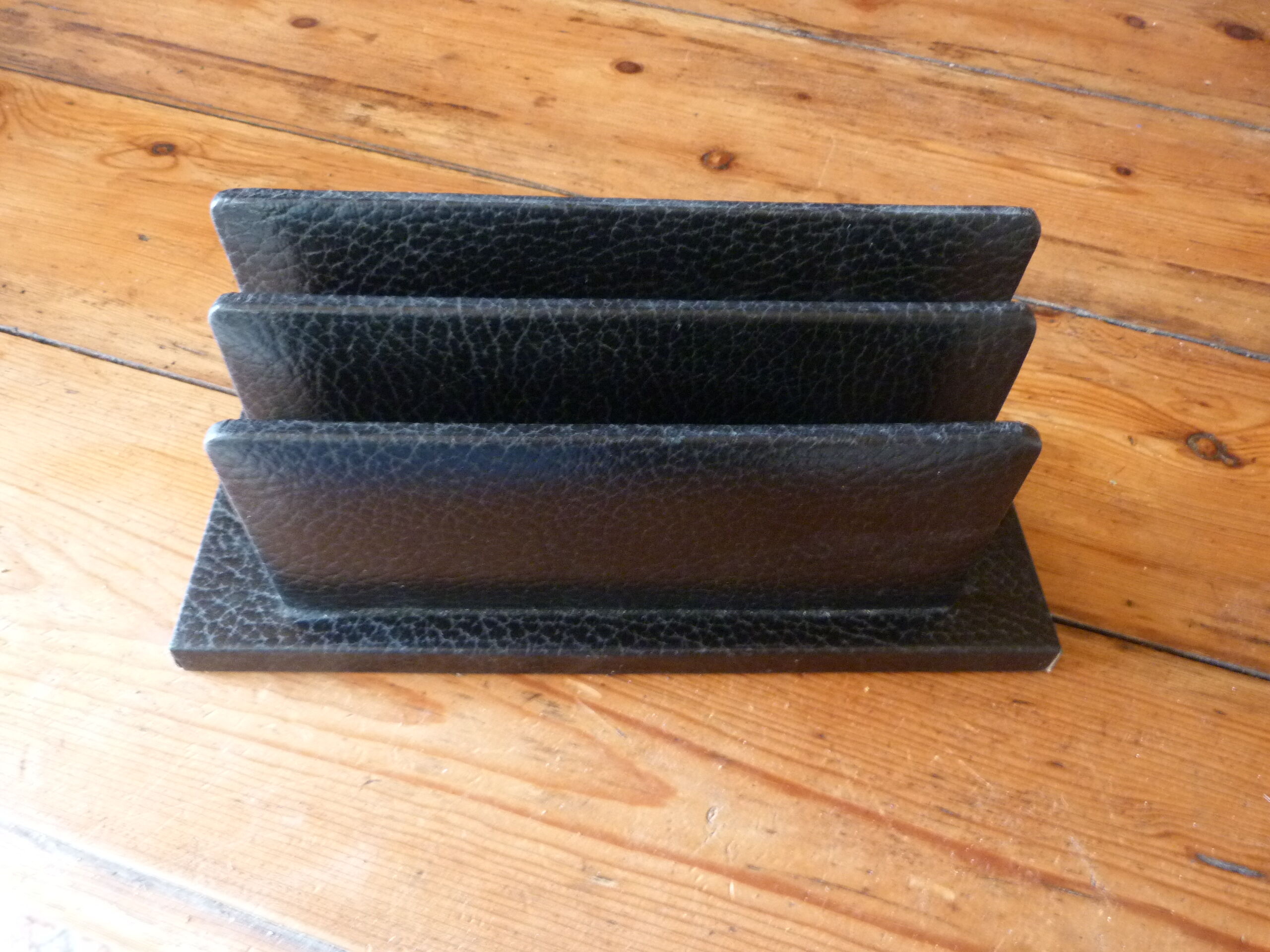 Vintage letter holder in black leather relief office accessory