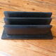 Vintage letter holder in black leather relief office accessory