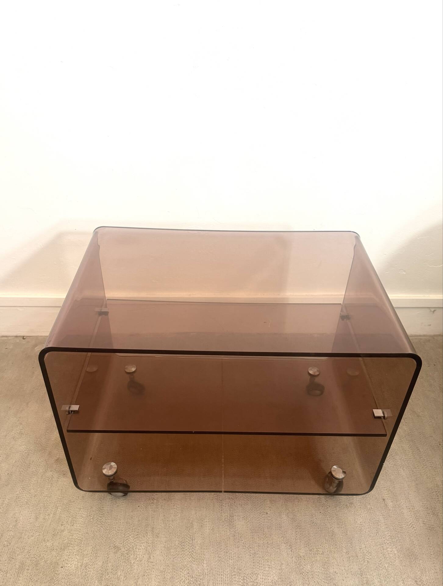 Coffee table / serving table in smoked plexiglass by Michel Dumas