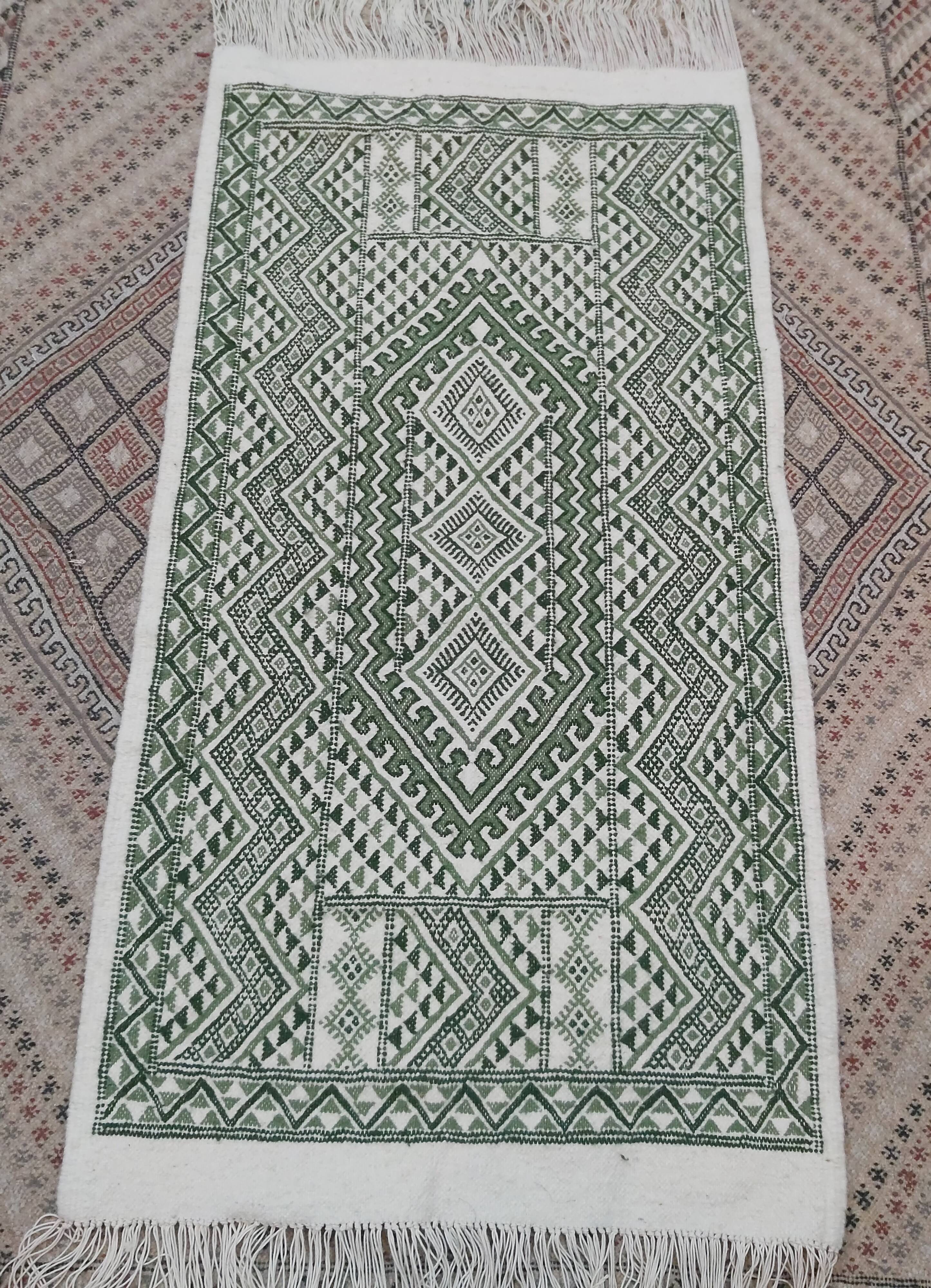 Classic white and green carpet handmade in pure wool
