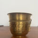 Brass pot cover