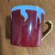 Hand-painted Limoges porcelain cup and saucer signed R. Blier