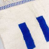 Tapis blanc avec des rectangles bleus 150cmx250cm