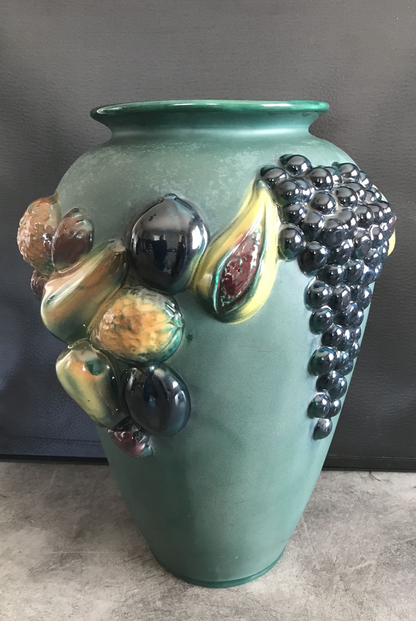 Green ceramic vase with polychrome decoration of fruits and vegetables in relief 33.5 cm