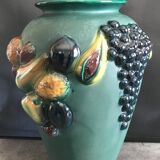 Green ceramic vase with polychrome decoration of fruits and vegetables in relief 33.5 cm