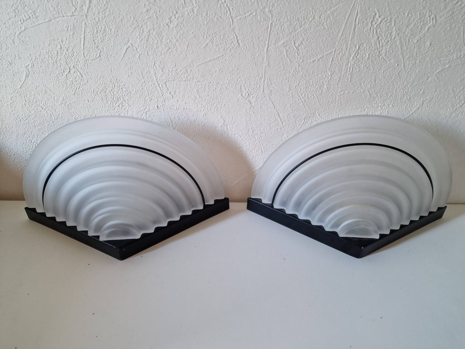 Pair of Italian design wall sconces in glass, art deco style.