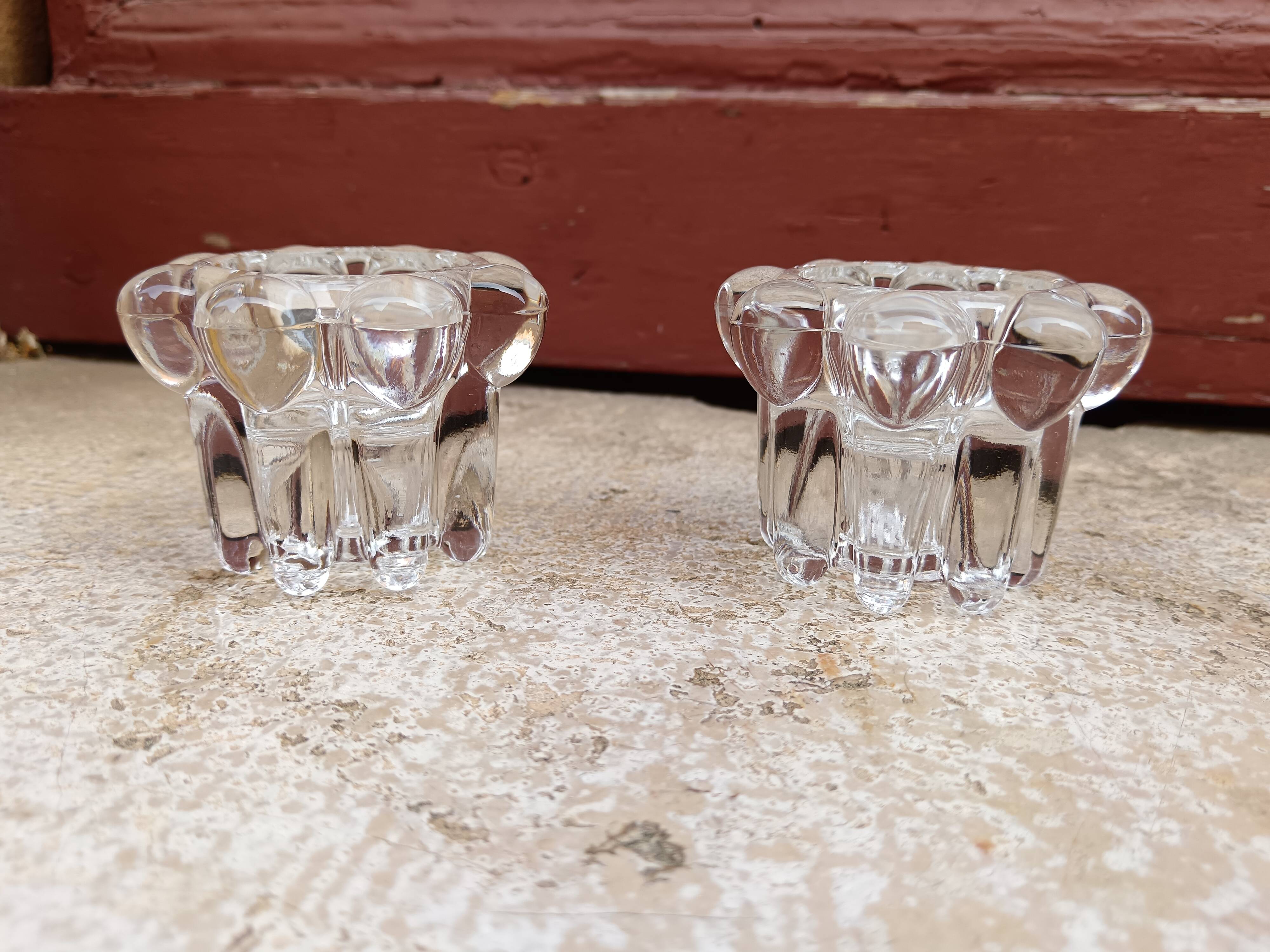 Pair of glass and crystal candlesticks in "bubble" style.