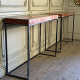 Pair of contemporary consoles in marble and metal.