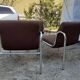 Table and 4 chairs in chrome metal with brown fabric and wood, Hungarian design from the 1960s.