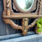 Antique “dragons” mirror in carved wood