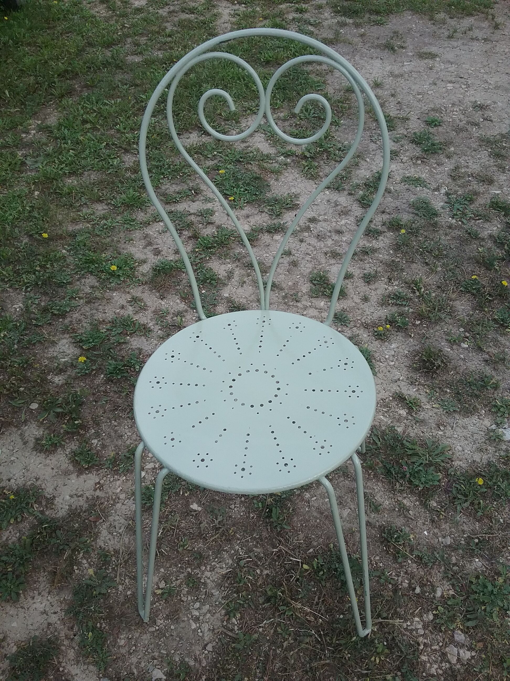Green wrought iron garden furniture